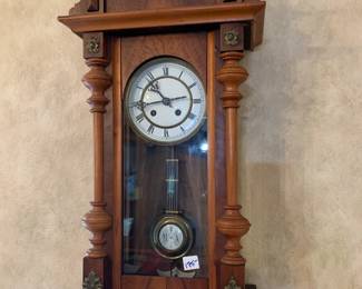 #200	 Wood Carved Clock w/Pendulum and key 11.5x28Tx6D 	 $175.00 
