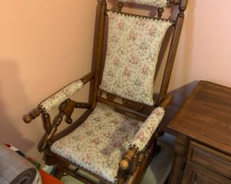 #45	Antique Platform Rocker - nail head trim, floral upholstery, wood frame, on wheels	 $75.00 

