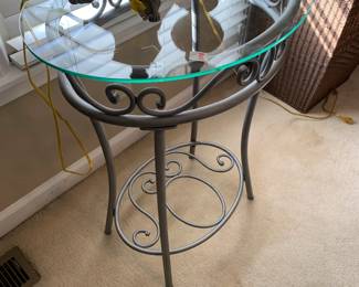 #105	metal base glass top table silver 22x17x29	 $40.00 
