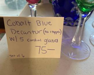 #126	Cobalt Blue Decanter  (Missing Stopper) w/ 5 Cordial Glasses 	 $75.00 
