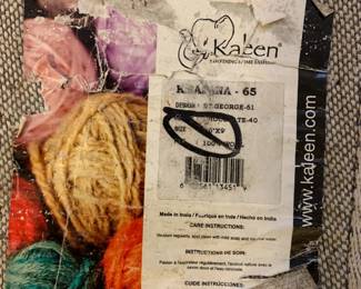 #6	Kalen brown flower machine made rug 9x7.4	 $120.00 
