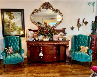 This sideboard is simply amazing!  Commanding presence with teal wingback chairs!  Add a mirror to complete the picture!