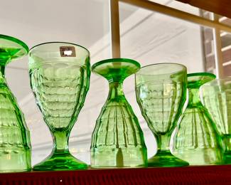 Pretty green depression glass water goblets.