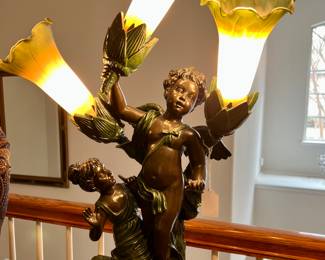 Wonderful tulip lamp with putti statue.