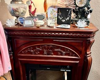 Electric fireplace heater.  Warm those cold nights!