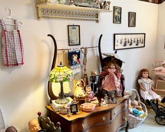 More antique oak, lots of Tiffany style lamps, and dolls!