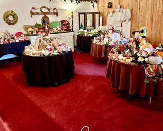Large banquet room with tables stuffed to overflowing.  