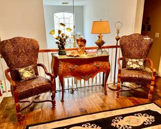 Upstairs landing with antique French commode with marble top.  