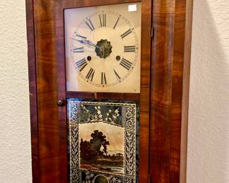 Another antique wall clock.