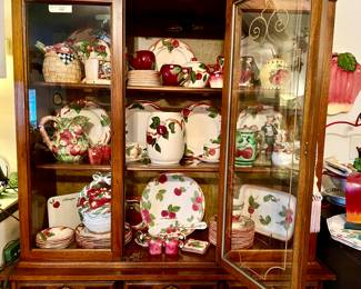 Another china hutch full of Apple Franciscan ware.