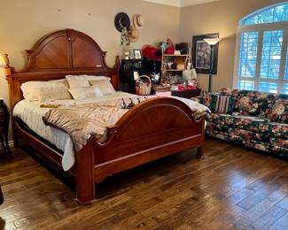 Master bedroom with nice King Bed, sofa, and lots of Vera Bradley.