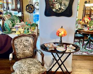 Sweet little vignette with antique French chair, bird tray with English chintz.