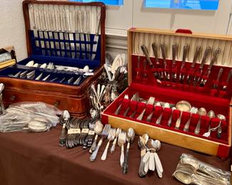 Vintage silverplate flatware sets.