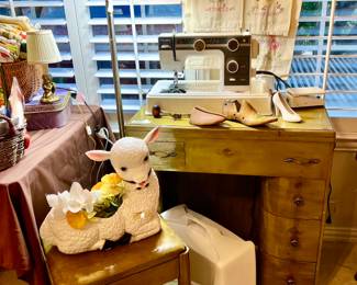 Singer Sewing machine in cabinet.  Janome sewing machine up top.  Needs some work.