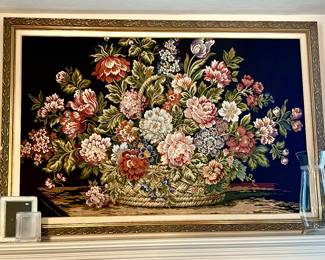 Large framed floral tapestry.