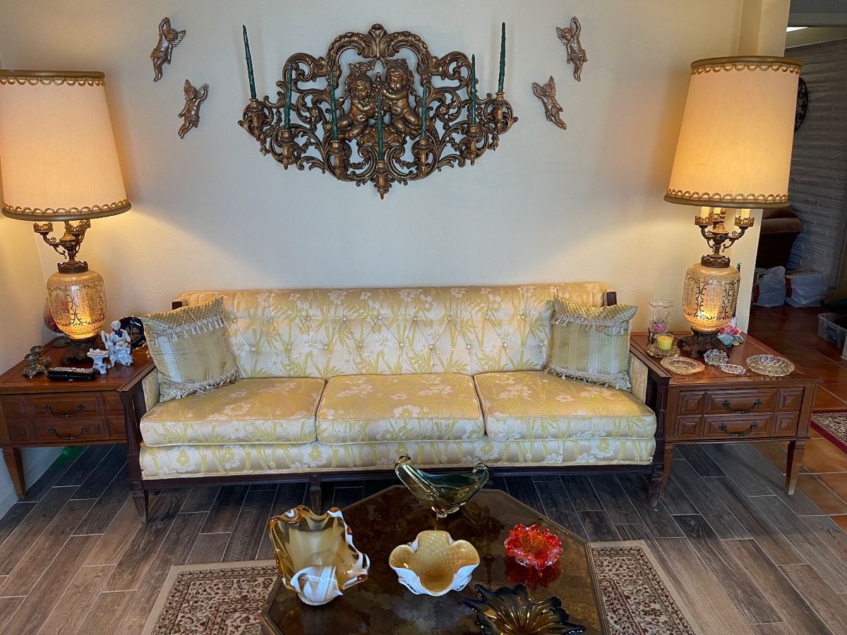 Vintage 3 cushion sofa, octagon coffee table, vintage 48" lamps, matching end tables, Home Interior Styroco Cherubs over couch, and lovely decorative items