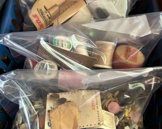 Vintage buttons, thread and fabrics.