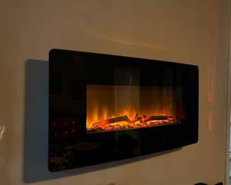 Cozy Muskoka electric fireplace / heater.