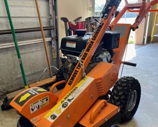 Tree stump grinder.   Looks barely used