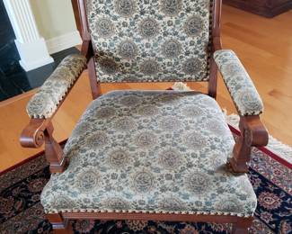 ANTIQUE UPHOLSTERED ARMCHAIR