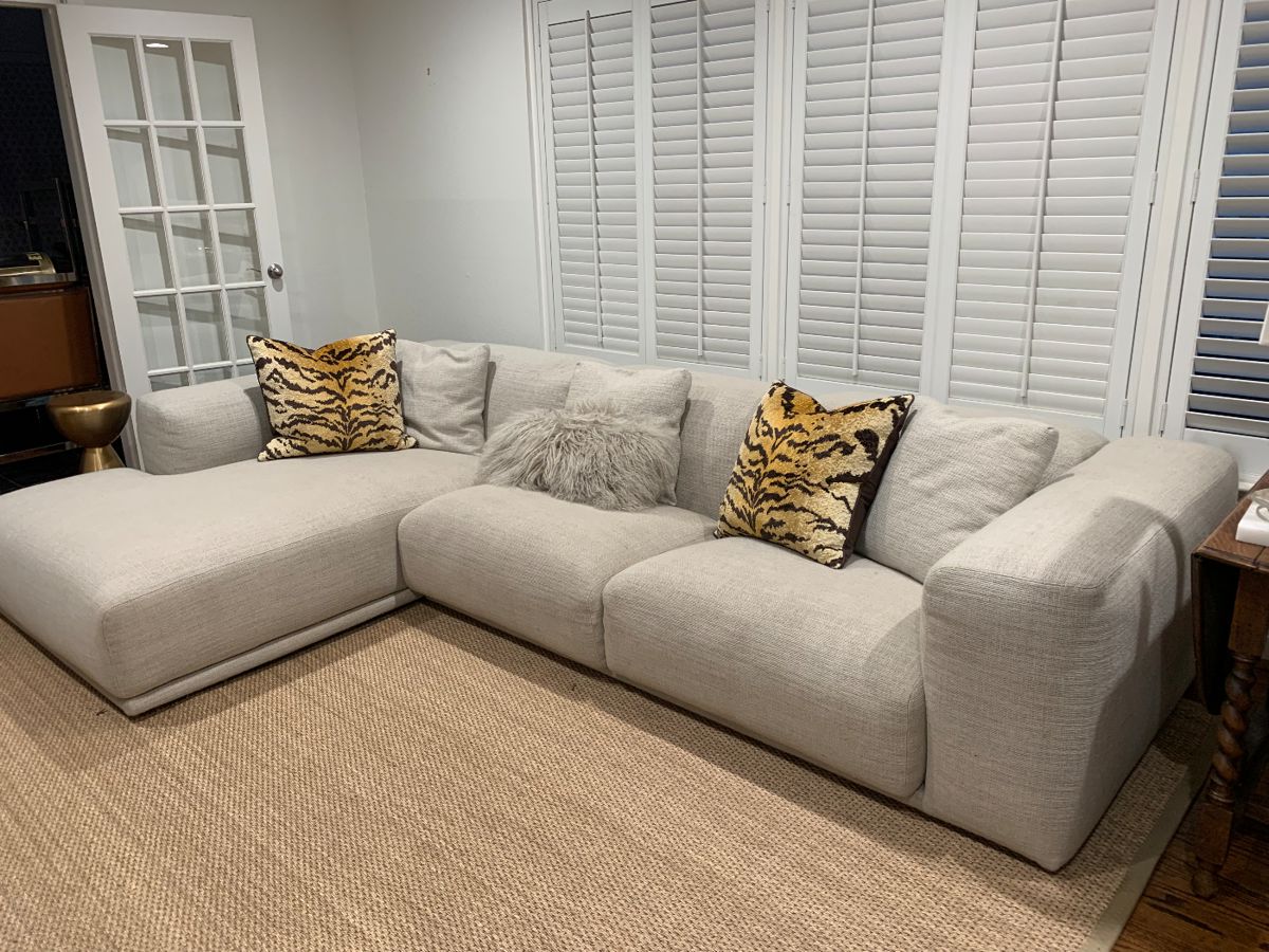 Gray sofa in living room - Design Within Reach - sofa with chaise - this is the Kelston sectional. Kelston Sectional – Design Within Reach (dwr.com). Excellent condition!