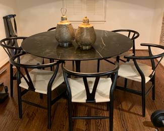 Marble round dining table - purchased in 2022 from Williams Sonoma - retails for $3000 Tulip Pedestal Dining Table | Williams Sonoma (williams-sonoma.com) wishbone chairs - 6 of them - also purchased in 2022 - Carl Henson designed from Design within Reach - retail for $1000 per chair Wishbone Chair – Design Within Reach (dwr.com)