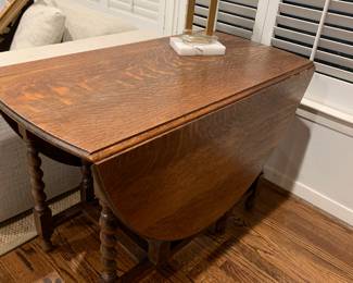 Antique solid wood round folding table.