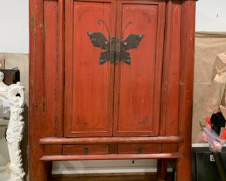 Red asian antique cabinet was purchased in Round Top, TX