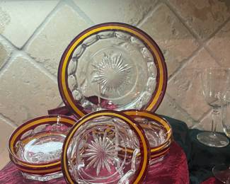 Burgundy and gold dishware