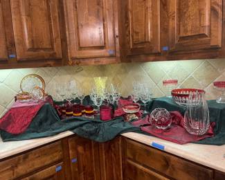 Beautiful burgundy and clear crystal/ glass dish and drink ware