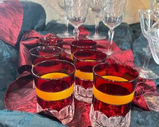 Beautiful etched stemware and burgundy and gold glasses
