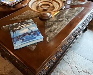 Close up of marble inlaid coffee table.