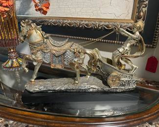 Elegant silver chariot inlaid with tiny crystal fragments