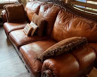 Closer view of plush leather sofa.