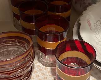 Burgundy and gold glassware and bowls