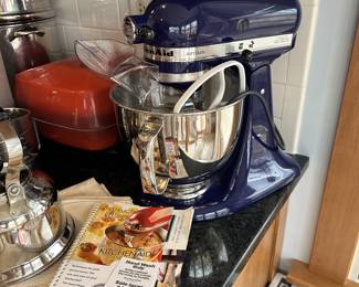 Cobalt Blue Artisan Kitchenaid Stand Mixer with Attachments and Recipe Books.
