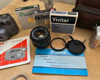 Canon FD 50mm 1.8 Lens with Filter and Lens Caps.