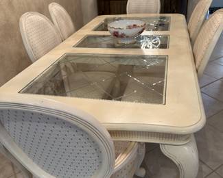 dining room table and 6 chairs. the dining table has three leaves 20 inches each. with the table opened is 128 inches. Table is $395.