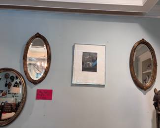 A pair of antique mirrors