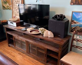 Another entertainment center or you could use it behind a couch