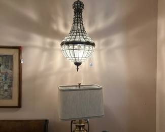 We have two of these pendants Antiques , a light from the top and the bottom