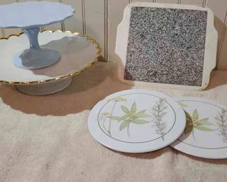 Cake Stands And Cooking Lot
Two cake stands. Two design imports Ltd riser trivets. Marble stone board.