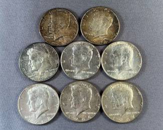 (8) Kennedy Half Dollars
