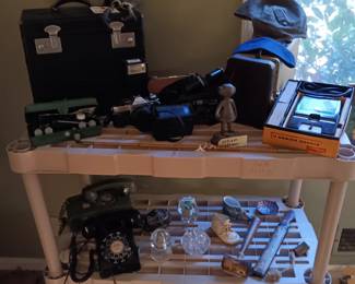 Rotary table phone, rotary wall phone, vintage cameras and slide projector and slides