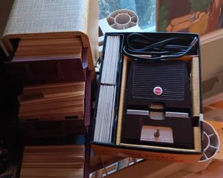 Vintage Kodak slide projector and  case of slides has sold