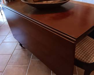 Handmade drop leaf table with 6 chairs and pads