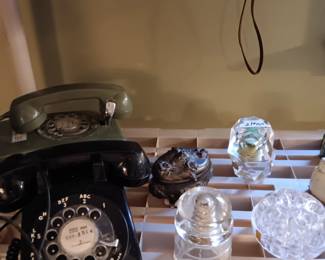 Green wall phone, Black table phone, Pyrex insulator, glass flower 🐸 and Embassy hand cut N.S.P. candle holders  Japan Orrefors crystal votive candle holder