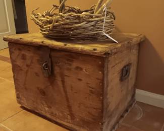 Primitive trunk and grapevine basket