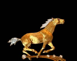 18K and Platinum, Diamonds and Ruby Horse Brooch. 