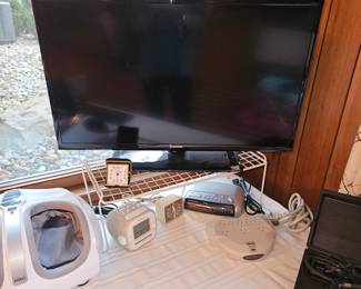 Panasonic #RC-6299 AM/FM Clock Radio, Timex Luminous Dial #7370-1A Alarm Clock, Sony Liv Dream Machine #ICF-C180, Samsung Smart TV #UN32EH4003F!